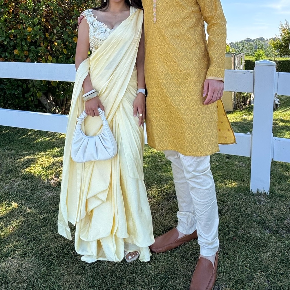 Pernia’s pop Up pastel yellow crème saree